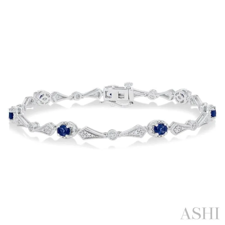 1/10 ctw Oval Cut 4X3 MM Sapphire and Round Cut Diamond Precious Bracelet in 10K White Gold