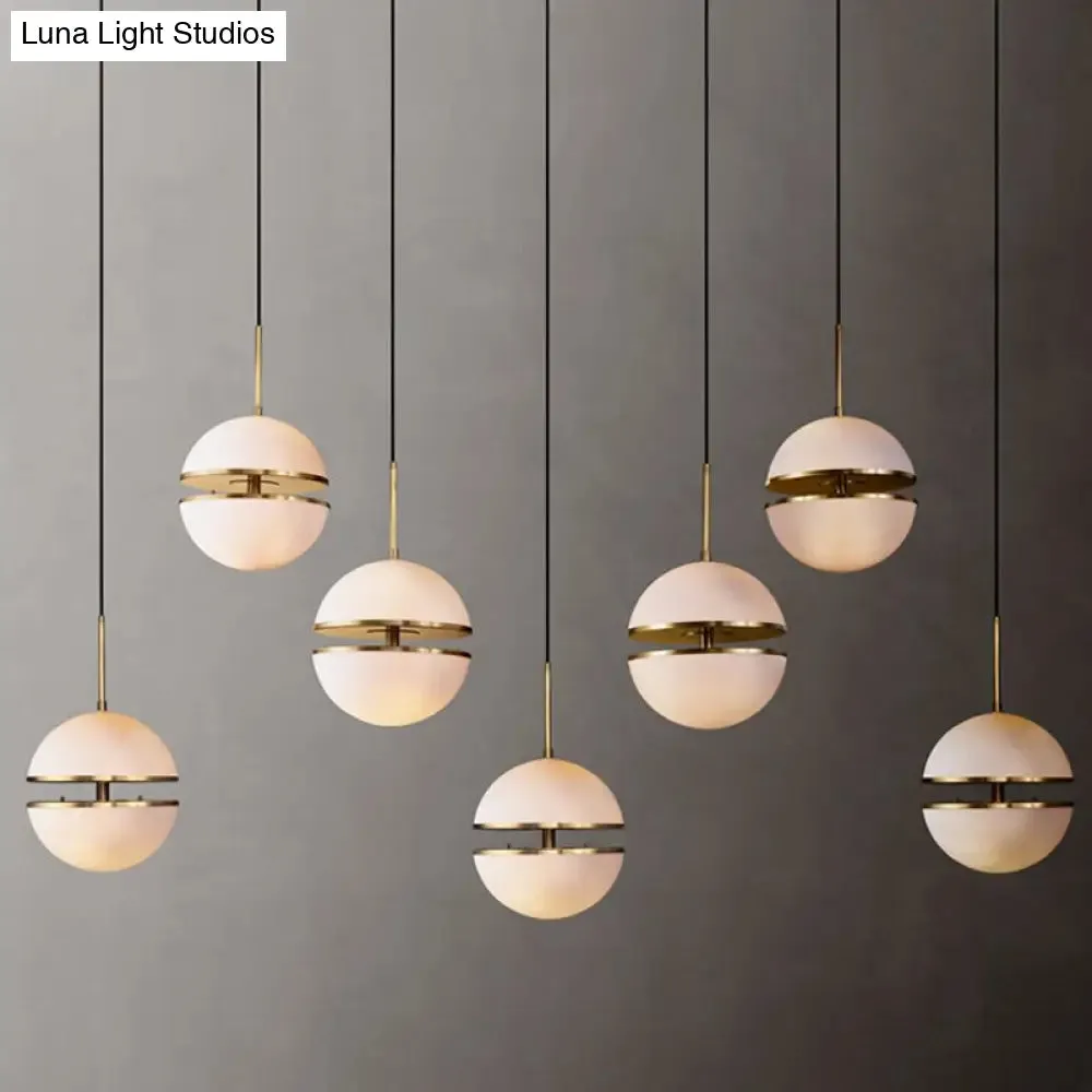 Frosted White Glass Sliced Sphere Hanging Lamp in Brass - Available in 3 Sizes